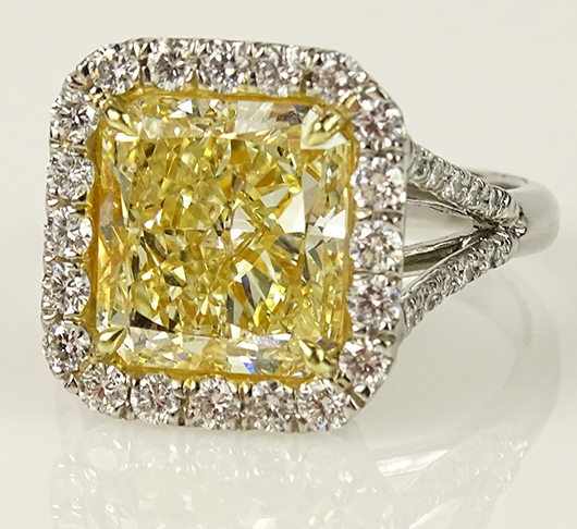 Platinum ring with fancy intense yellow diamond, 6.05 carats. Price realized: $59,000. Kodner Galleries image.